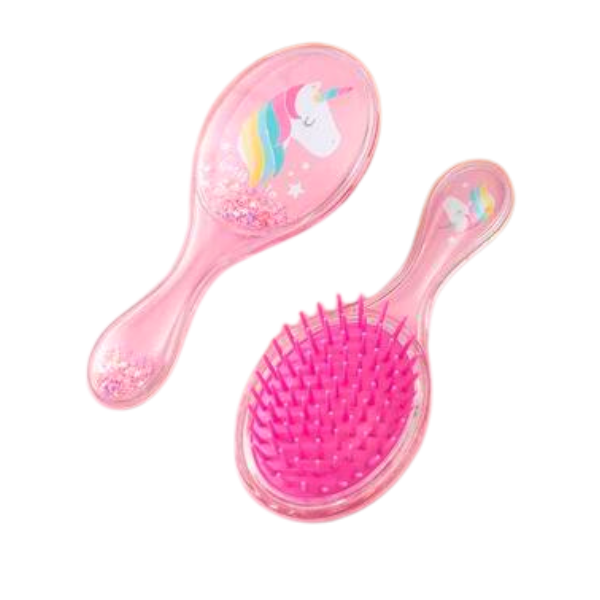 Small pink hairbrush with a colourful unicorn and sequins on the back.